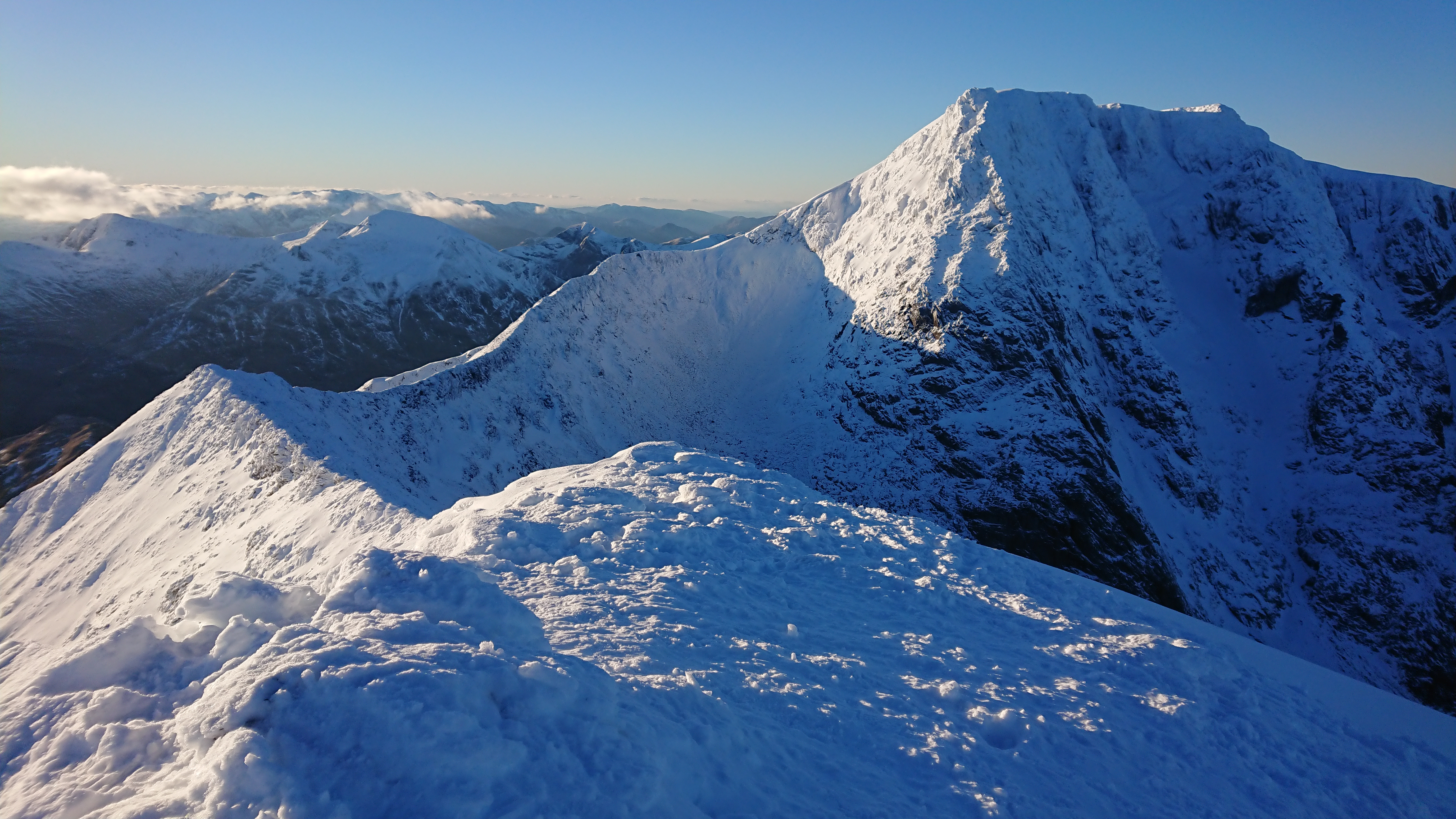 View of the Càrn Mòr Dearg arête and Ben Nevis from the summit