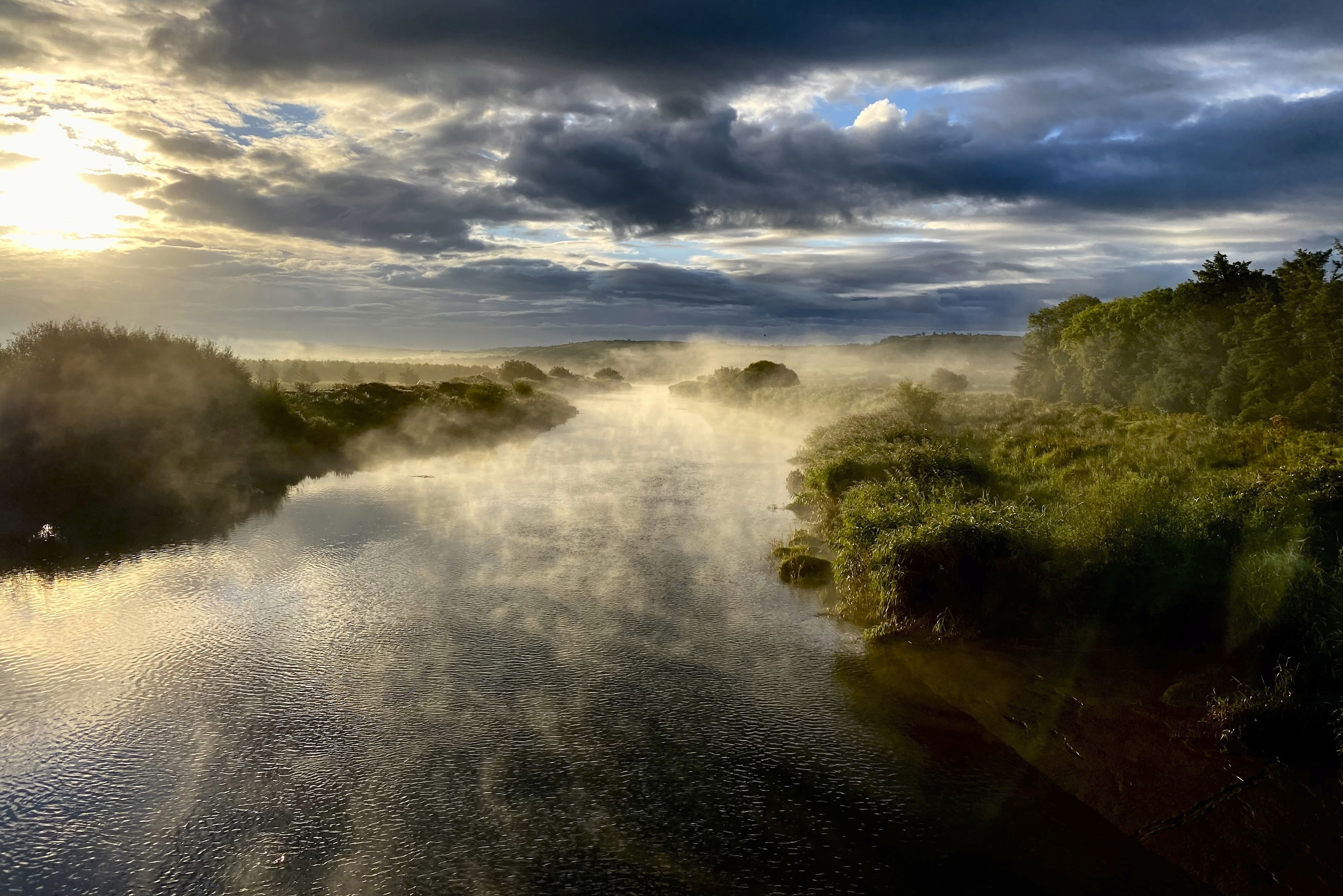 Evaporation fog on the River Maine